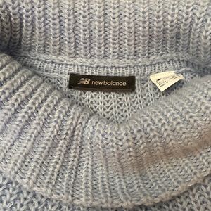 Soft blue turtleneck sweater. Not scratchy.